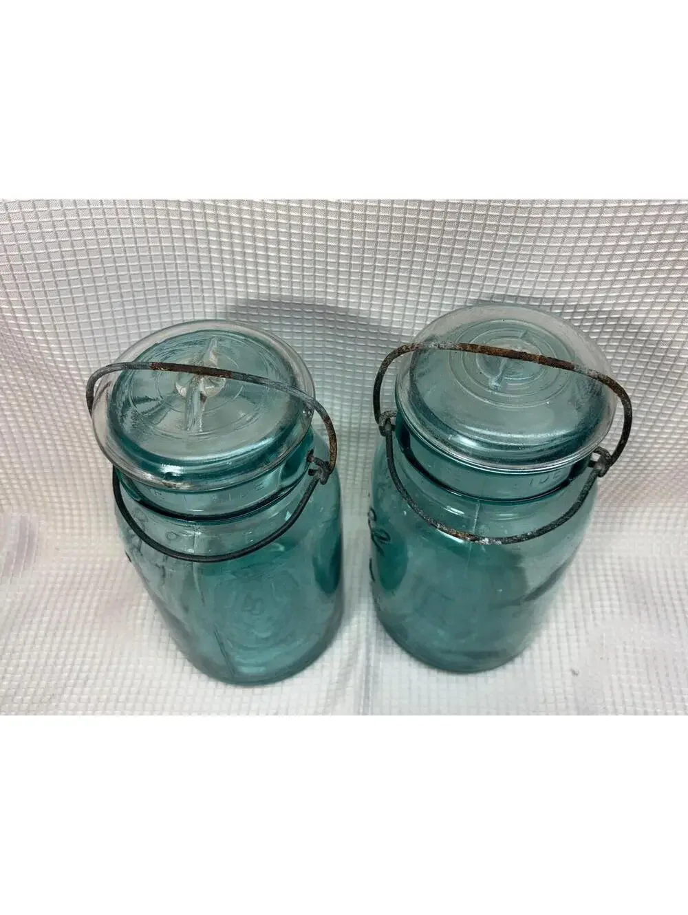 62 - 2 vintage round Blue canning jars wire lock glass lids -  Ball